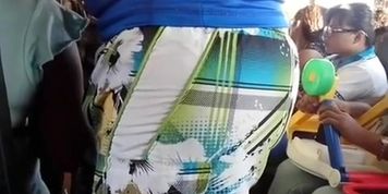 Man touches woman's arm