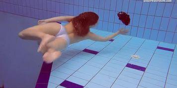 Fun naked girls get naughty in the pool
