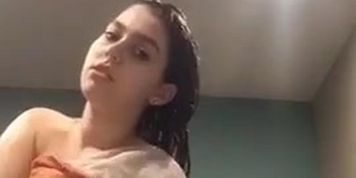 petite girl with big and puffy nipples after shower