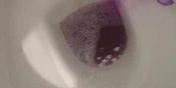 Sexy pissing at restaurant's rest room