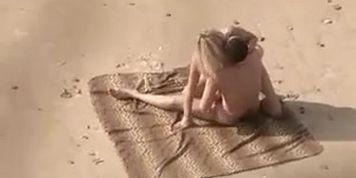 Voyeur on public beach. Hot young couple sex1