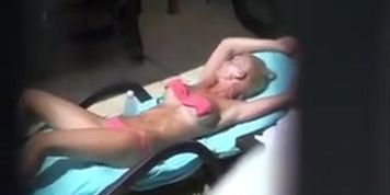 nice view of a blonde teaser by the pool