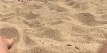 Flashing cock to girl on beach