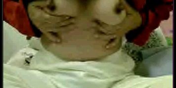 Mature Woman Teases Her Tits