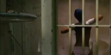 Ella Reid Breasts Scene  in Caged Heat