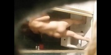 Spying my sis in law in the shower