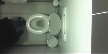 Spy camera in public toilet ceiling