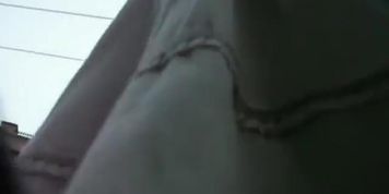 Young up white skirt view caught in the street