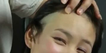 Chinese Girl Shaved Head and Eyebrows