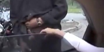 Dogging girl gives handjobs out the car window