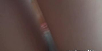 Cute Japanese girl solo plays with hairy pussy on camera