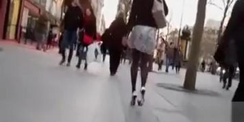 Fashionable hottie in heels and pantyhose on the street