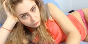 Blonde reveals her pussy and tits