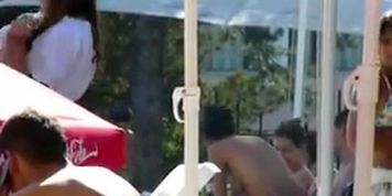Swimming pool - topless girl