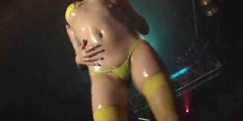 Oiled up asian stripper dancing