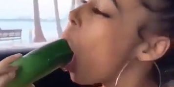 Sucking a banana
