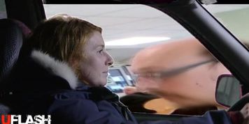 Woman driver watches man jerking