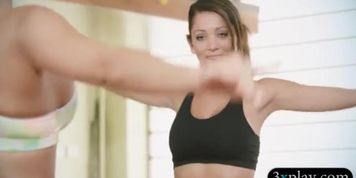 Two babes learning new yoga exercises with busty trainer