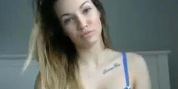 Busty girl striptease and giving big blowjob