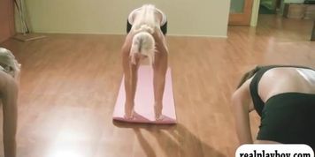 Hot babes and busty trainer doing yoga while all naked