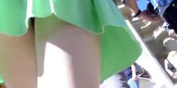 Horny street ups of the sexy teenager in short green skirt