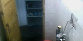 She removes costume and showers
