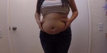 Chubby Asian Showing Off Belly