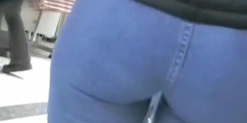 Slim Latina with a big booty shows her sexy butt in jeans