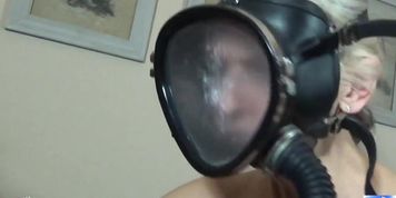 Lesbians in latex screw with gasmask dildo