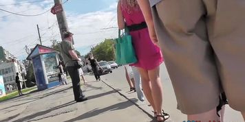 Upskirt cam presents blonde's succulent buttocks
