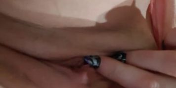 masturbating a shaved pussy with fingers with long nails