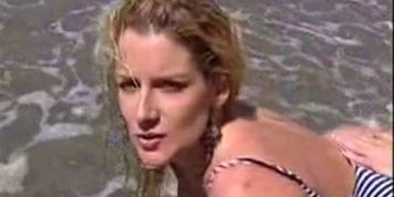 sally layd on the beach