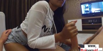 Amateur Thai teen Cherry giving a sensual handjob to a big white dick
