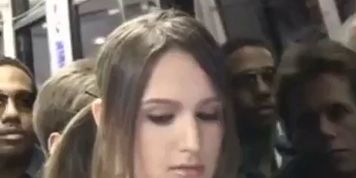 White giril caught on bus