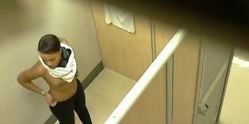 Black chick with a big ass filmed while trying on bras