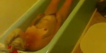 unaware mature wife in bath