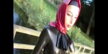 Latex Hijabi outside Walking