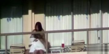Couple has public sex on a hotel balcony