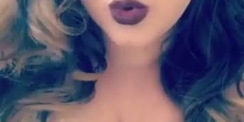 The busty & beautiful Brittney Bitch smoking sexy