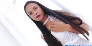 Beautiful ladyboy gets her asshole reamed by white cock
