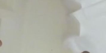 Black slut pisses in the shower