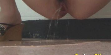 PISS JAPAN TV - Japanese babe urinating in public stairwell