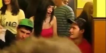 Showing her cleavage in public