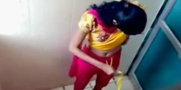 Indian coed girls get caught on tape using the university toilet
