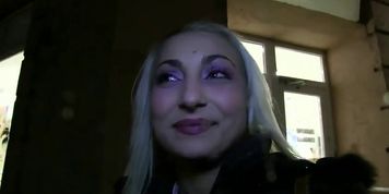 Blonde fucked from behind in public hallway