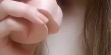 Hot blondy with natural boobs sucks big dildo after work