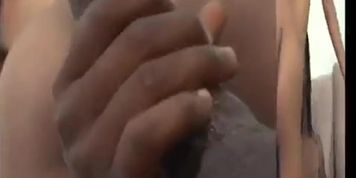 Lusty chocolate beauty plays with dildo before getting fucked by dude with big black dick porn
