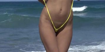 Hot asian girl naked by the beach