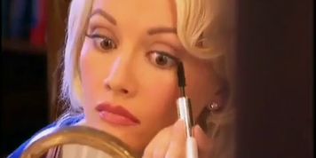 Holly Madison Breasts Scene  in The Girls Next Door