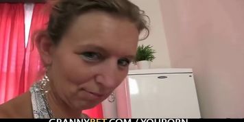 Mature masseuse takes it from behind